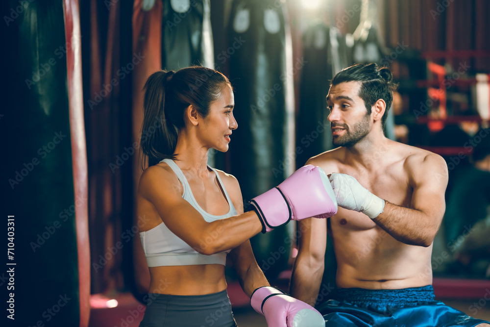 Vitality and smart young couple, friend or boxer and trainer helping to ...