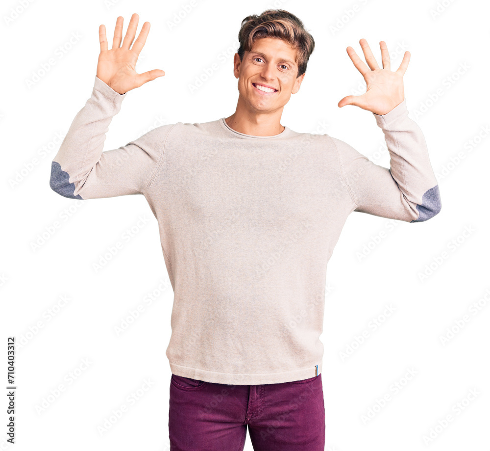 Young handsome man wearing casual clothes showing and pointing up with fingers number ten while smiling confident and happy. Young handsome man wearing casual clothes showing and pointing up with fingers number ten while smiling confident and happy.
