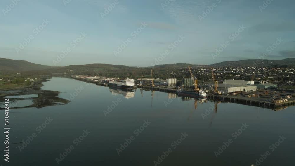 Passenger Ferry Moored At The Port On Carlingford Lough In County Louth, Ireland. aerial shot Passenger Ferry Moored At The Port On Carlingford Lough In County Louth, Ireland. aerial shot