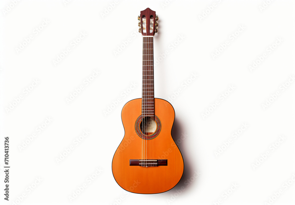 Obraz premium A photo of an ii classical guitar, in the style of realistic, detailed rendering, traditional mexican style, light orange and brown, folk/naïve:, aerial view, shaped canvas