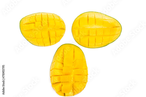 Three sliced cut into cubes fresh organic green mango delicious fruit flat lay face photo concept isolated on white background clipping path