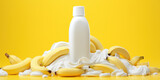 White plastic bottle with white cream and bananas on a yellow background. Flavored shampoo or fruit yogurt advertising banner.