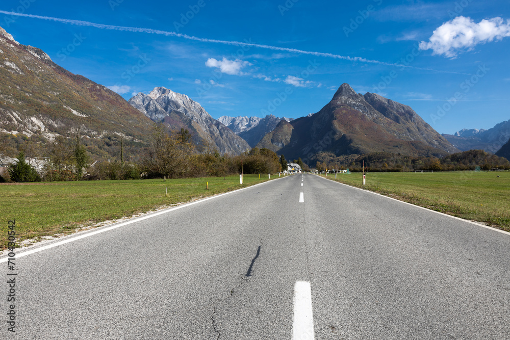 Fototapeta premium Infinity Vanishing Point Road into Mountains Copy Space Background