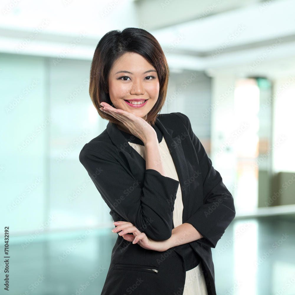A young asian businesswoman on white background A young asian businesswoman on white background