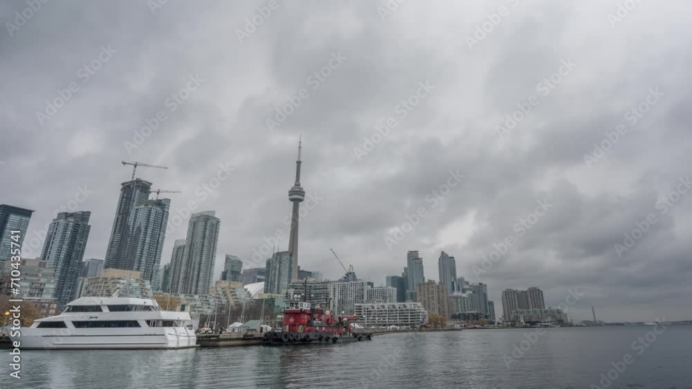Time Lapse shot of Harbour front with a cruise ship during a cloudy evening in Toronto, Canada. Time Lapse shot of Harbour front with a cruise ship during a cloudy evening in Toronto, Canada.