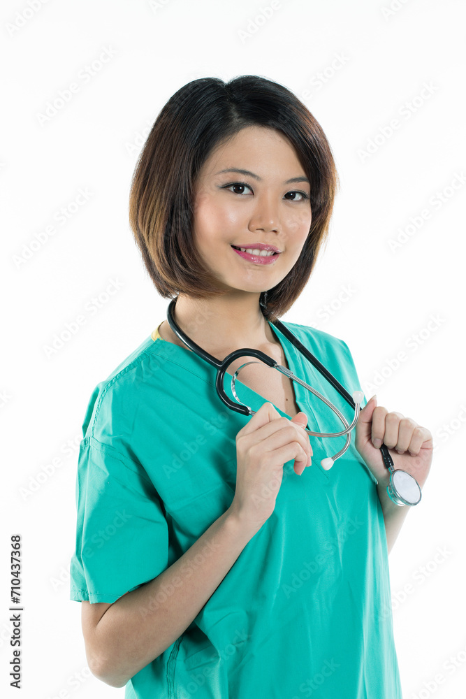 Chinese women doctor wearing a green scrubs Chinese women doctor wearing a green scrubs