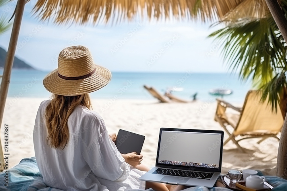 Young woman using laptop computer on beach, freelancer girl working remote, Freelance work, online learning, distant work, connection concept.