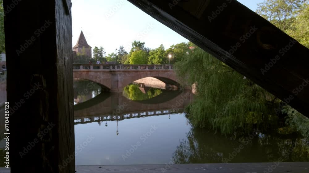Camera pulls back through rails on Hangmans Bridge wtih Maxbrucke in Nuremberg, Germany Camera pulls back through rails on Hangmans Bridge wtih Maxbrucke in Nuremberg, Germany