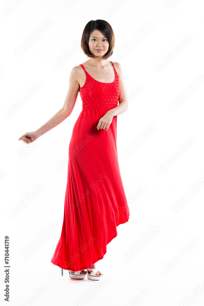 Happy Chinese woman wearing red summer dress