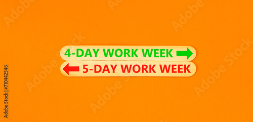 5 or 4 day week symbol. Concept word 5-day work week or 4-day work week on beautiful wooden stick. Beautiful orange table orange background. Business and 5 or 4 day week concept. Copy space. photo