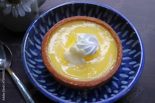 Lemon Tart or lime key pie. A perfect blend of sweet and tangy taste. A buttery, golden crust embraces a luscious lemon filling, promising a burst of citrusy bliss. 
