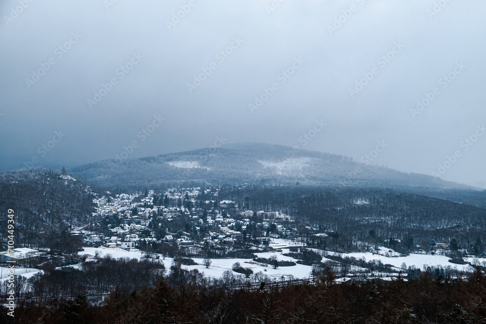 fog over the mountains in winter with snow-capped hill fog over the mountains in winter with snow-capped hill