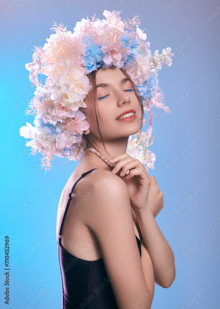 a gentle woman in a flower wreath as a symbol of spring and beauty