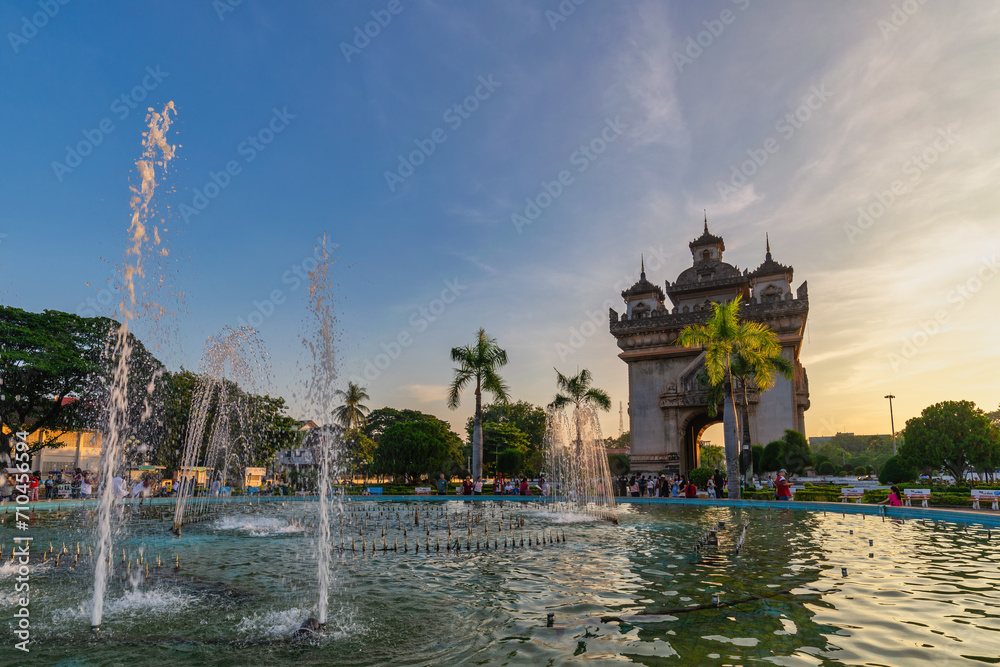 Vientiane, Laos - October 13, 2018 : sunset city skyline at Patuxai (Patuxay) and fountain the most famous landmark in Vientiane