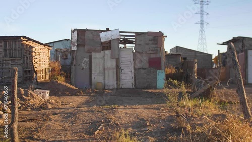 Poverty, inequality. Poor house in a low-income neighborhood. Third world. Abandoned house.