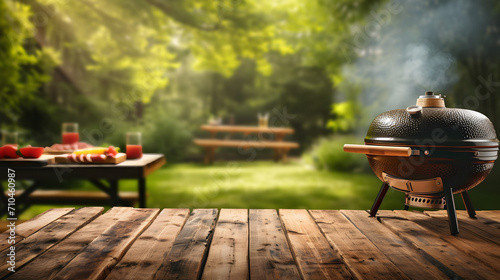 BBq grill in the back yard background with empty wooden table photo
