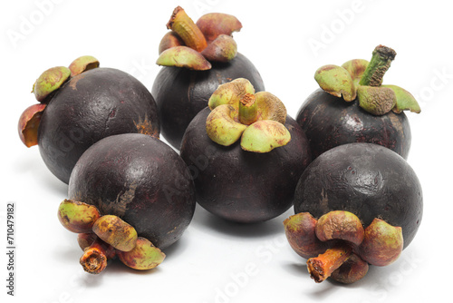 Six fresh organic mangosteen delicious fruit isolated on white background clipping path