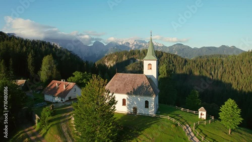 Aerial view of the beautiful Slovenian Alpine landscape with St Spirit church photo