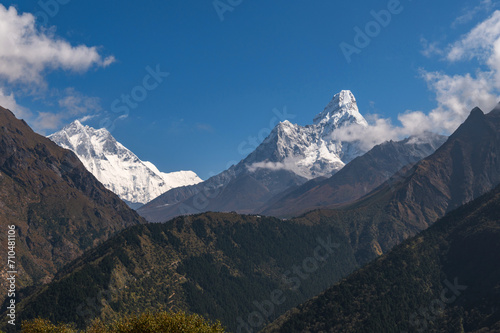 View of Lhotse and Ama Dablam mountains during trekking in Nepal in a clear day. EBC Everest Base Camp or Three passes trek in Nepal. Mountain range Himalayas in the Khumbu region of Nepal, Asia.