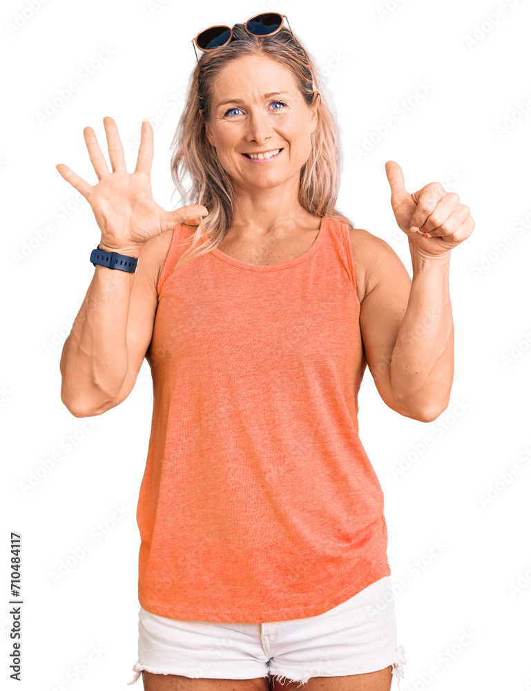 Middle age fit blonde woman wearing casual summer clothes and sunglasses showing and pointing up with fingers number six while smiling confident and happy. Middle age fit blonde woman wearing casual summer clothes and sunglasses showing and pointing up with fingers number six while smiling confident and happy.