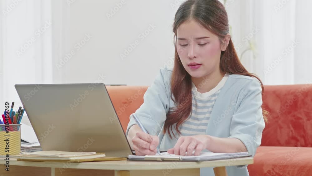 Asian Business woman writing down requirement and ideas to book for planing Business Startup,Feeling so happiness and working with positive emotional,Small Business Startup Concept Asian Business woman writing down requirement and ideas to book for planing Business Startup,Feeling so happiness and working with positive emotional,Small Business Startup Concept