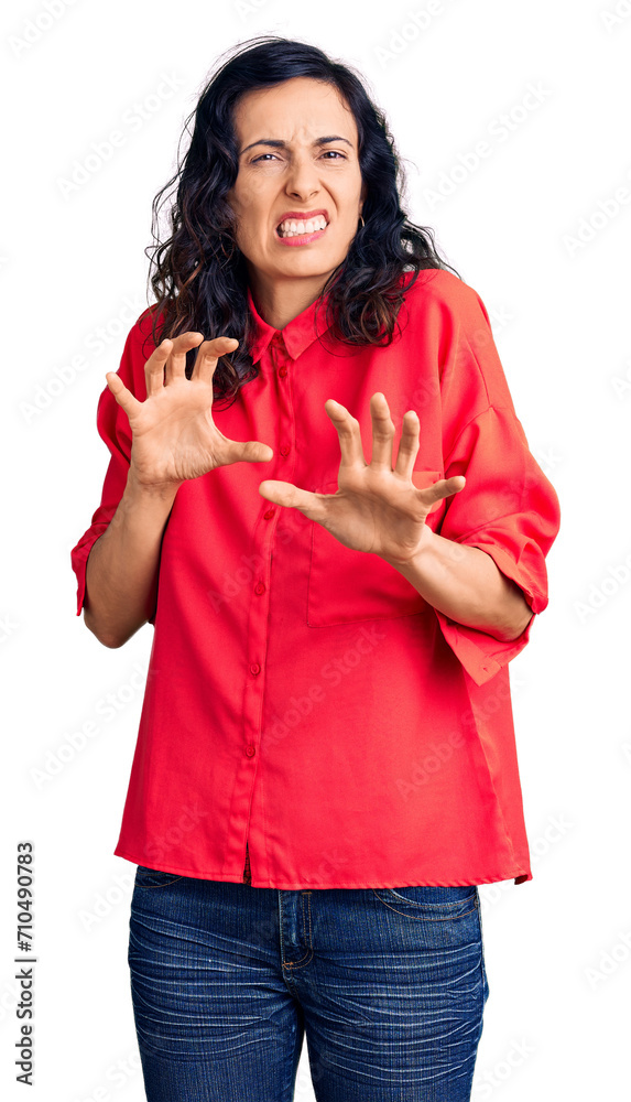 Young beautiful hispanic woman wearing casual clothes disgusted expression, displeased and fearful doing disgust face because aversion reaction. with hands raised Young beautiful hispanic woman wearing casual clothes disgusted expression, displeased and fearful doing disgust face because aversion reaction. with hands raised