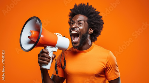 Man is shouting into a megaphone