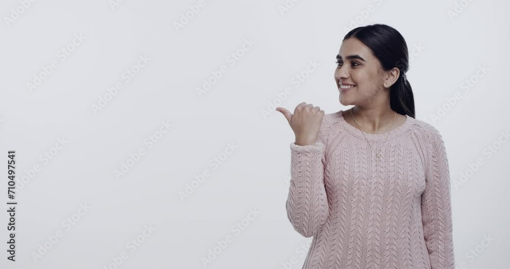 Studio mockup, smile and woman point to discount promotion, sales offer or commercial direction. Choice, ads space and portrait of happy model gesture at service announcement on white background