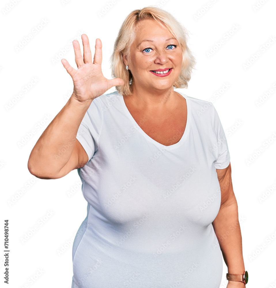 Middle age blonde woman wearing casual white t shirt showing and pointing up with fingers number five while smiling confident and happy. Middle age blonde woman wearing casual white t shirt showing and pointing up with fingers number five while smiling confident and happy.