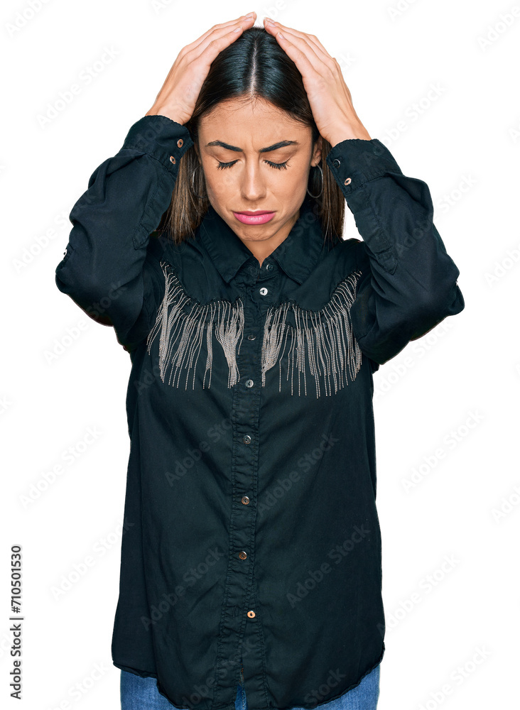 Young hispanic woman wearing casual clothes suffering from headache desperate and stressed because pain and migraine. hands on head. Young hispanic woman wearing casual clothes suffering from headache desperate and stressed because pain and migraine. hands on head.