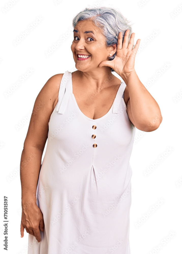Senior woman with gray hair wearing casual clothes smiling with hand over ear listening an hearing to rumor or gossip. deafness concept. Senior woman with gray hair wearing casual clothes smiling with hand over ear listening an hearing to rumor or gossip. deafness concept.