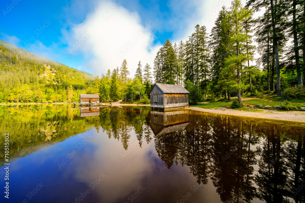 Fototapeta premium View of the surrounding landscape at Ödensee in Bad Mitterndorf in Styria. Nature at the clear swimming lake in the Salzkammergut in Austria. 