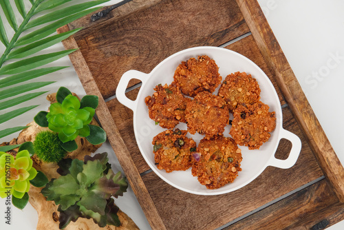 Crispy fried lentil fritters,Parippu ,dal, paripu vada from South Indian cuisine. savoury fried snack also called dal vada, vadai or Masala vada is a popular South Indian street food 