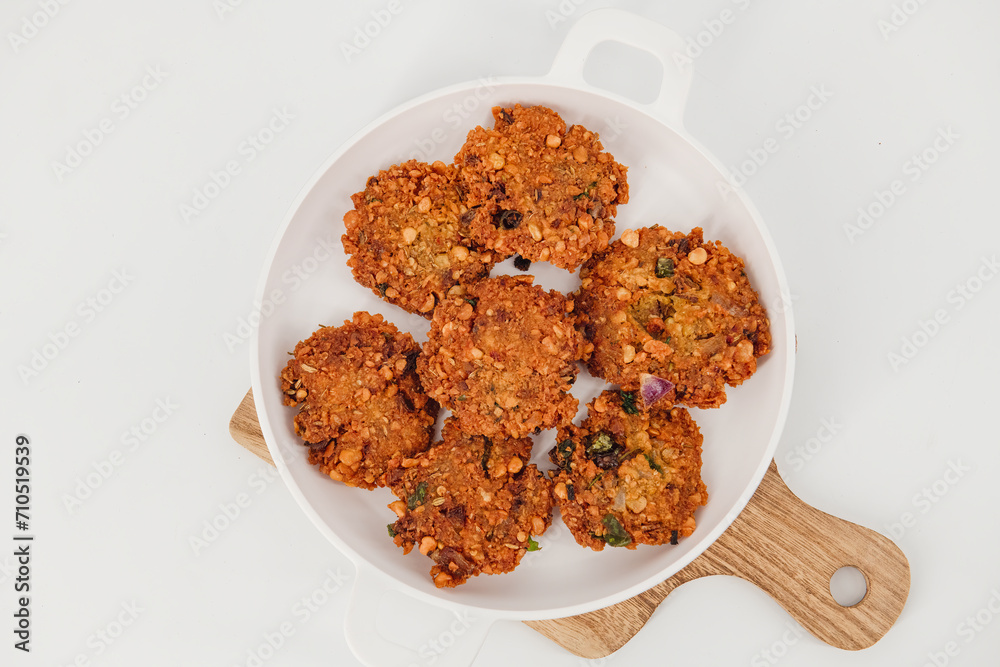 Crispy fried lentil fritters,Parippu ,dal, paripu vada. savoury fried snack also called dal vada, vadai or Masala vada popular Indian street food and a tea time snack, called Paruppu Vadai