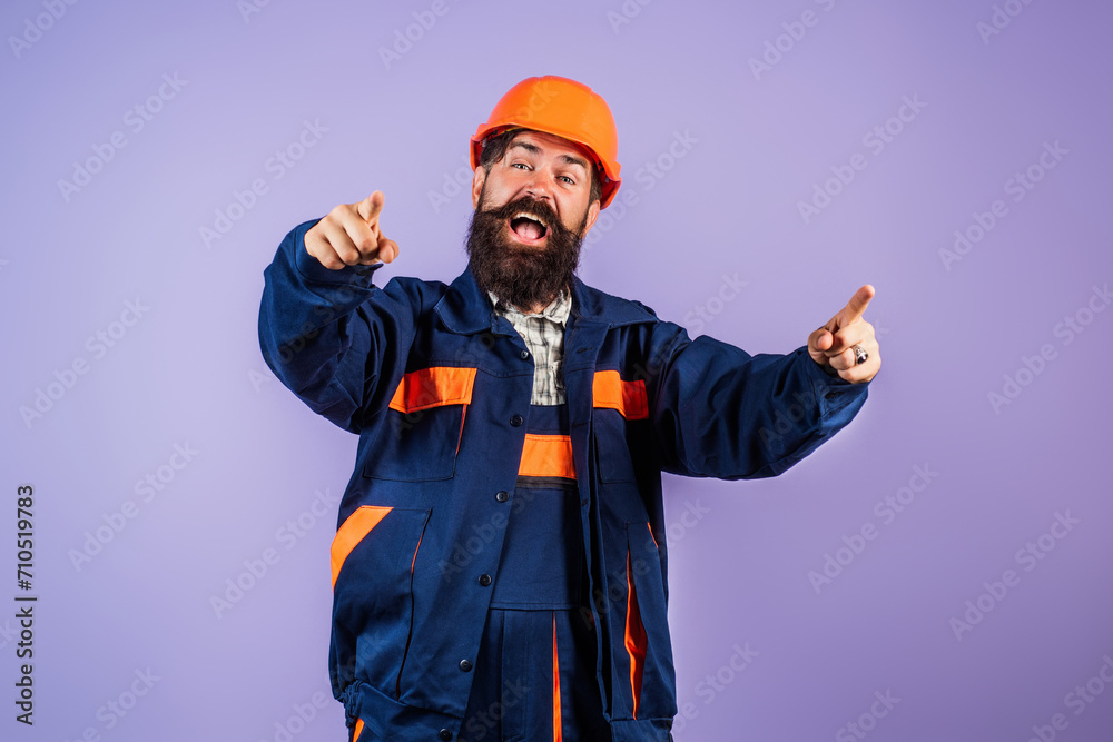 Excited Worker in hardhat. Construction Worker with helmet. Worker in helmet at building. Portrait of Engineer Builder with Helmet. Worker from building site. Workers helmet and uniform.