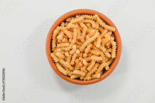 Obraz na płótnie Butter murukku – also known as benne murukku, benne chakli or venna murukku. Murukku is a deep fried crisp snack made with rice flour and gram flour. Crispy and Deep Fried muruku. w salonie