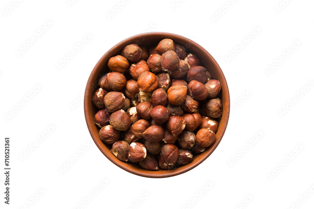 Roasted hazelnut in bowl isolated on white background. hazelnut is snack or raw of cook. Healthy food concept Roasted hazelnut in bowl isolated on white background. hazelnut is snack or raw of cook. Healthy food concept