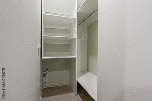 interior apartment room dressing room, hangers, storage system © evgeniykleymenov