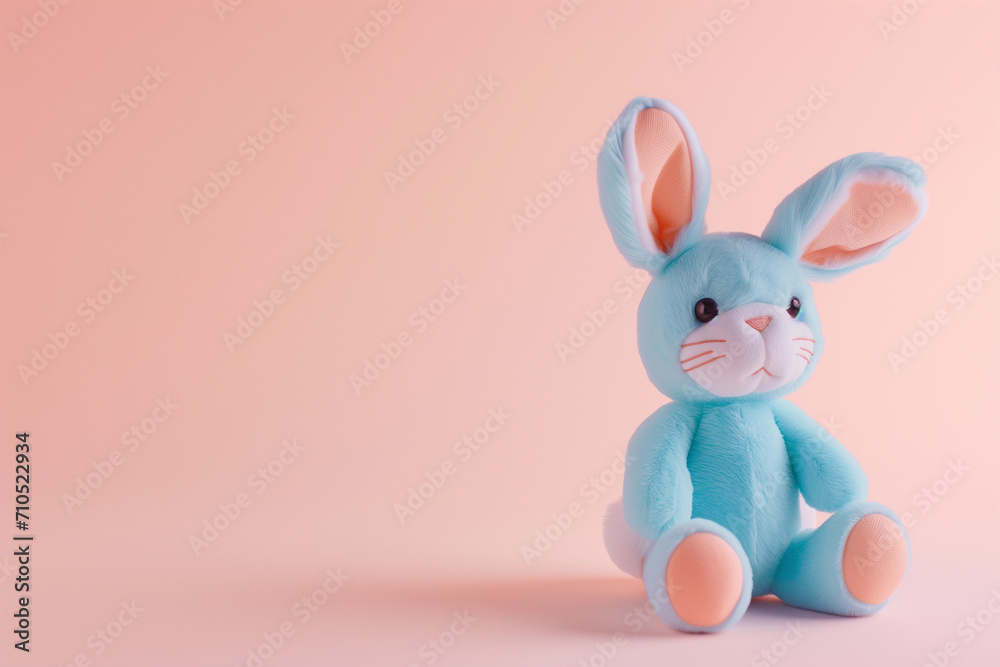 Cute Easter bunny rabbit soft kids toy with blank empty space for baby product or text mockup, plain backdrop background  