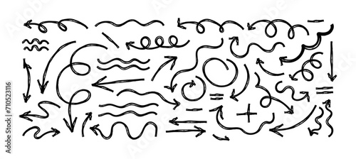 Hand drawn crayon chalk charcoal line arrows set. Many curvy and wavy arrows isolated on white background. Group of squiggles and scribbles strokes. Elements for diagrams. Vector doodle 
