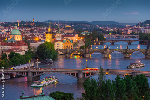 View of Charles Bridge and Prague downtown crossing the Moldava River (Vltava River) in Prague, Praha, Czechia, Czech Republic. photo