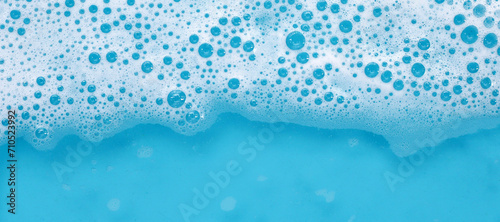 Blue water bubble. White soap foam photo