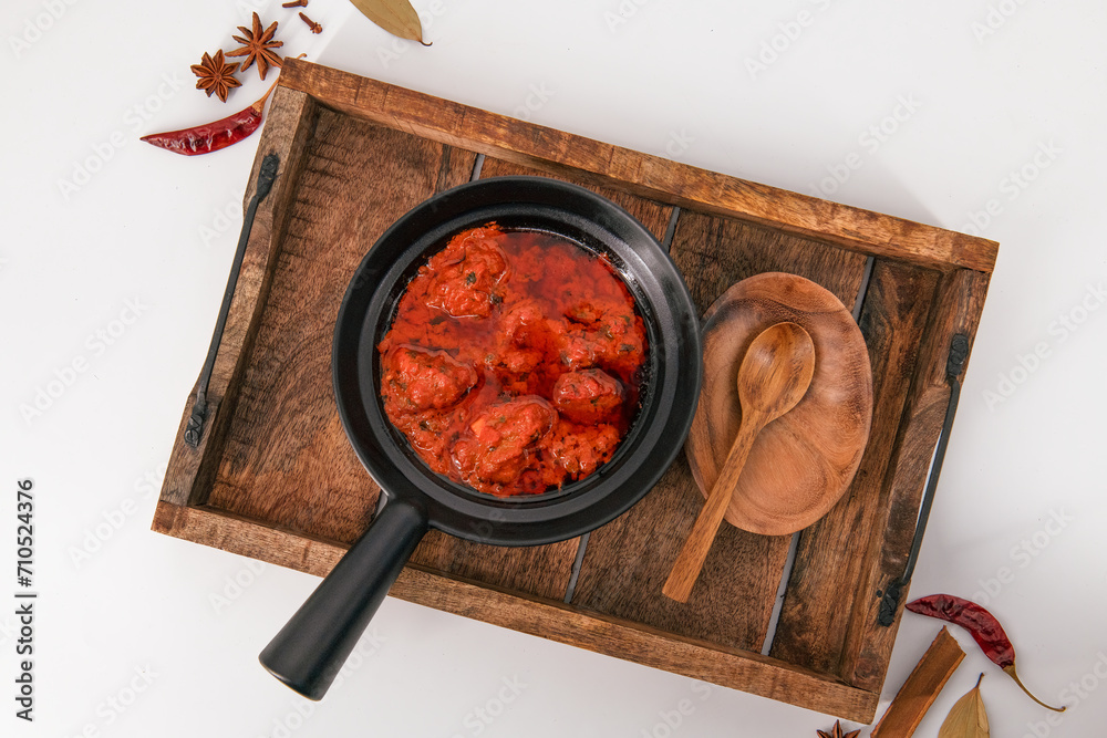 Famous lamb recipe called Mutton Rogan josh or lamb rogan josh,Indian mutton curry prepared with spices and served with plain rice, chapati, roti or butter naan. J