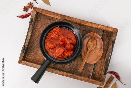 Obraz na płótnie Famous lamb recipe called Mutton Rogan josh or lamb rogan josh,Indian mutton curry prepared with spices and served with plain rice, chapati, roti or butter naan. J w salonie