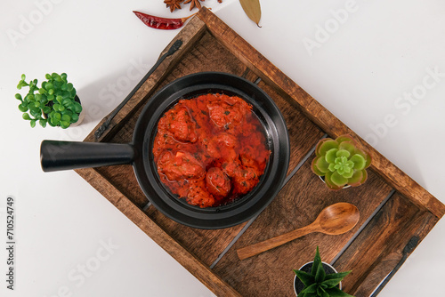 Famous lamb recipe called Mutton Rogan josh or lamb rogan josh,Indian mutton curry prepared with spices and served with plain rice, chapati, roti or butter naan. 