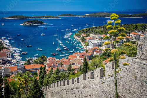View of boats on Hvar island in Dalmatia during summer in Croatia. photo