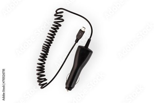 Black car charger with USB output cable for charging old-style phones on a white background.