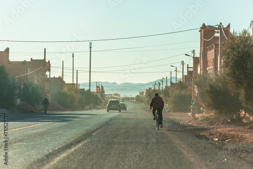 View of a road crossing a village in central Morocco. photo