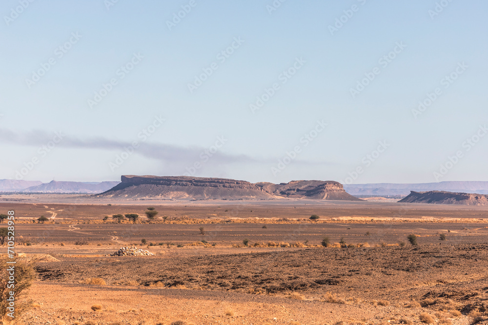 View of the plateau and valley near the Sahara desert in Errachidia Province, Morocco. View of the plateau and valley near the Sahara desert in Errachidia Province, Morocco.
