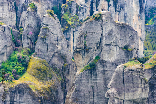 View of unique and enormous columns of rock rising precipitously from the ground in Meteora region, Trikala, Thessaly, Greece. photo